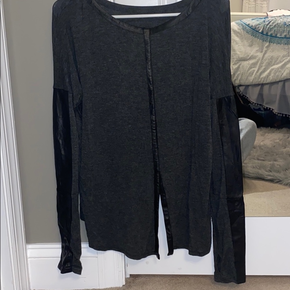 Faux leather lined tunic. Size m/l